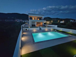 Holiday house with a swimming pool Banjol, Rab - 22703